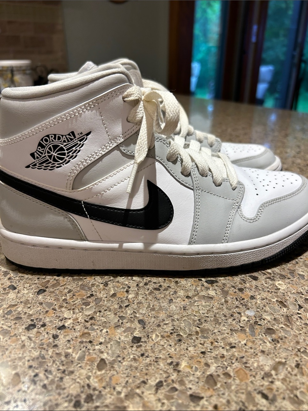 Jordan Women’s Mid-Top Sneakers in White, Black, and Light Gray